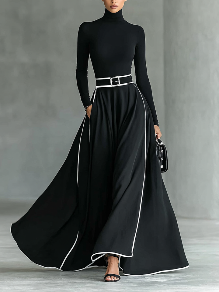 Schwarzes Maxikleid mit weißen Nähten