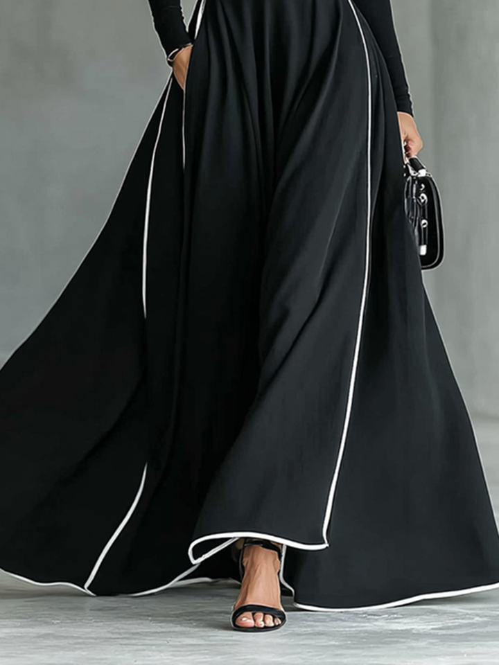 Schwarzes Maxikleid mit weißen Nähten
